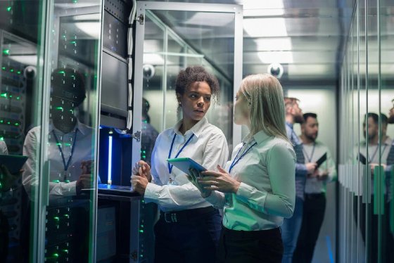 colleagues-working-in-server-room