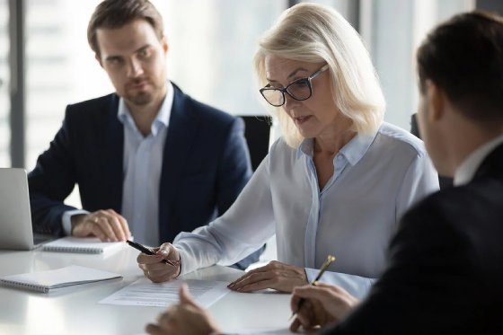 people-looking-over-documents